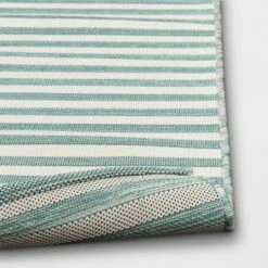 5'x7' Narrow Wornstripe Rectangular Woven Outdoor Area Rug Turquoise Blue - Threshold™ -Brick Wall GUEST de24221f eb98 4b3d 8215 da45667ce98e